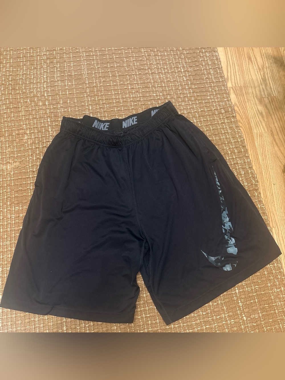 Nike Men’s Black Athletic Shorts with Camo Swoosh Accent